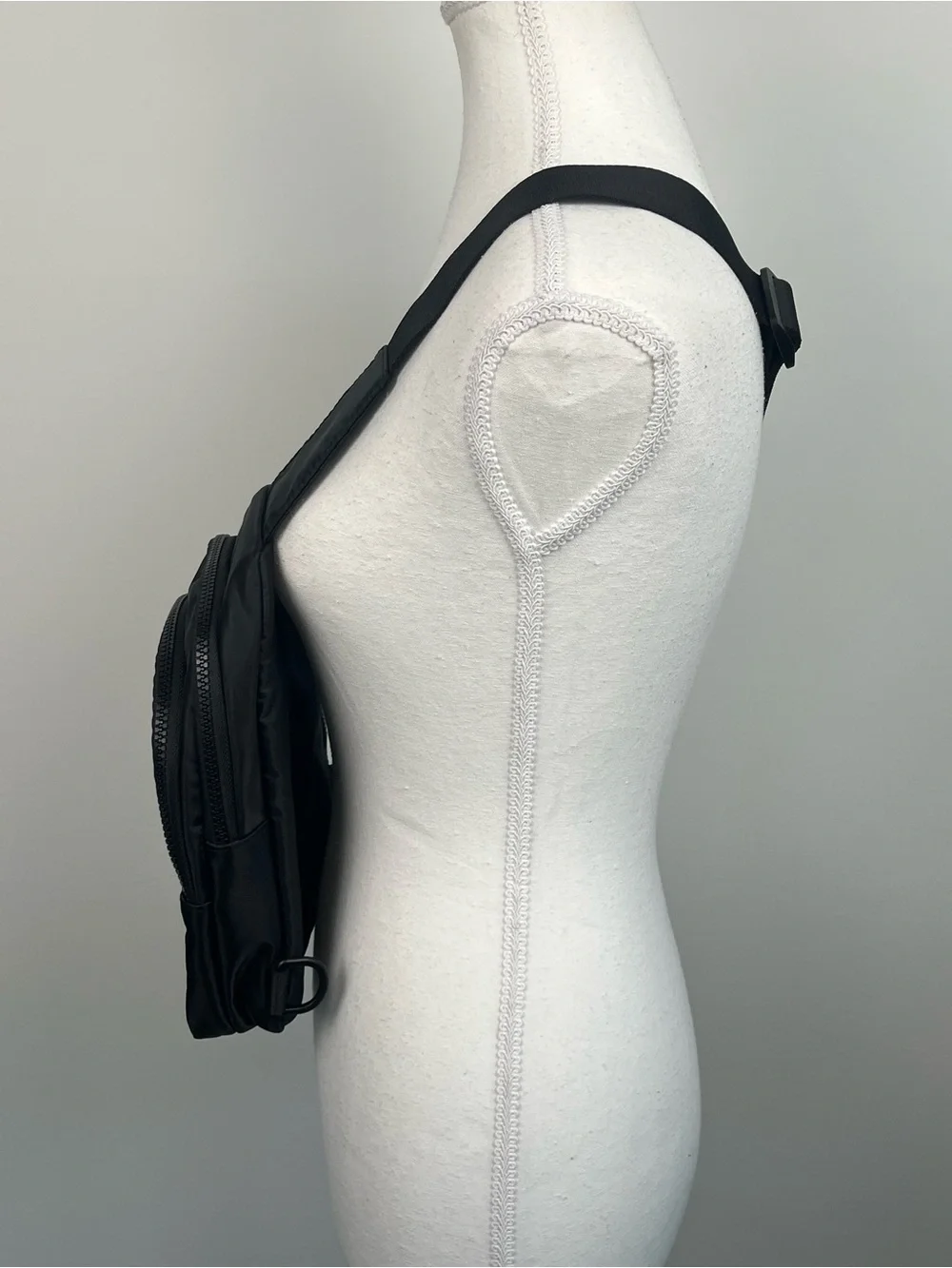 Gogo black nylon convertible strap mini crossbody sling bag.